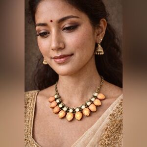 Decorative costume jewelry necklace coral colored glass brass chain choker style